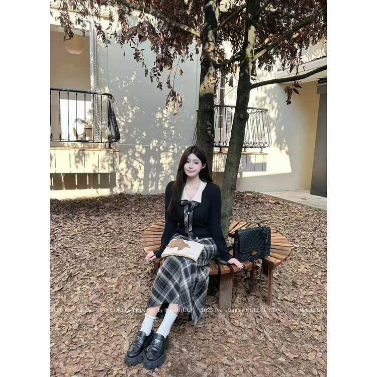 【韩都艺高】温与柔复古美式学院风显瘦针织长袖小众格子高腰半裙