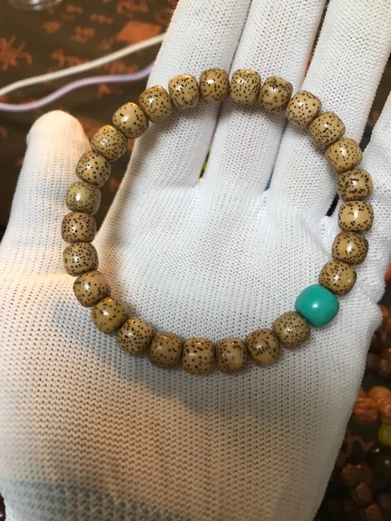 海南星月菩提鸡油黄手串