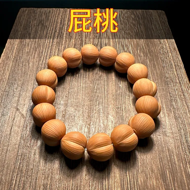 猴头核桃雕刻屁桃手串高端正圆拉丝聚宝盆小核桃男款文玩手持男士
