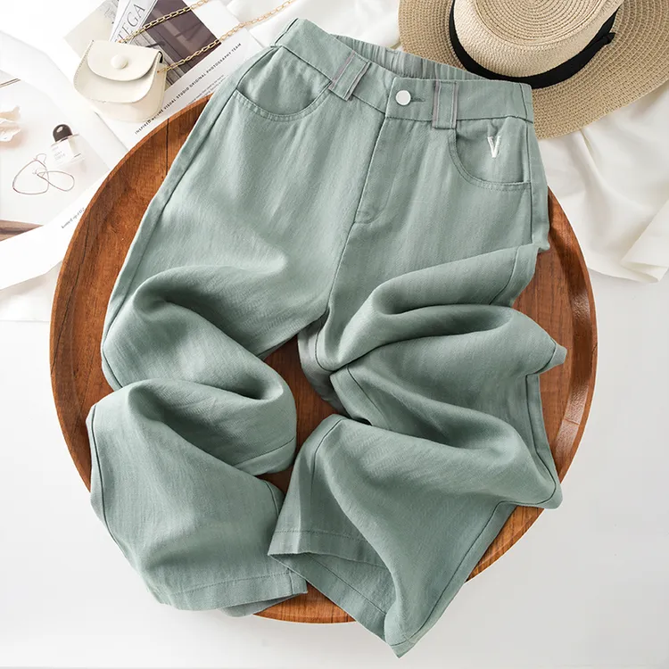 绿色亚麻休闲直筒裤女2025春夏季新款松紧天丝薄款高腰显瘦阔腿裤