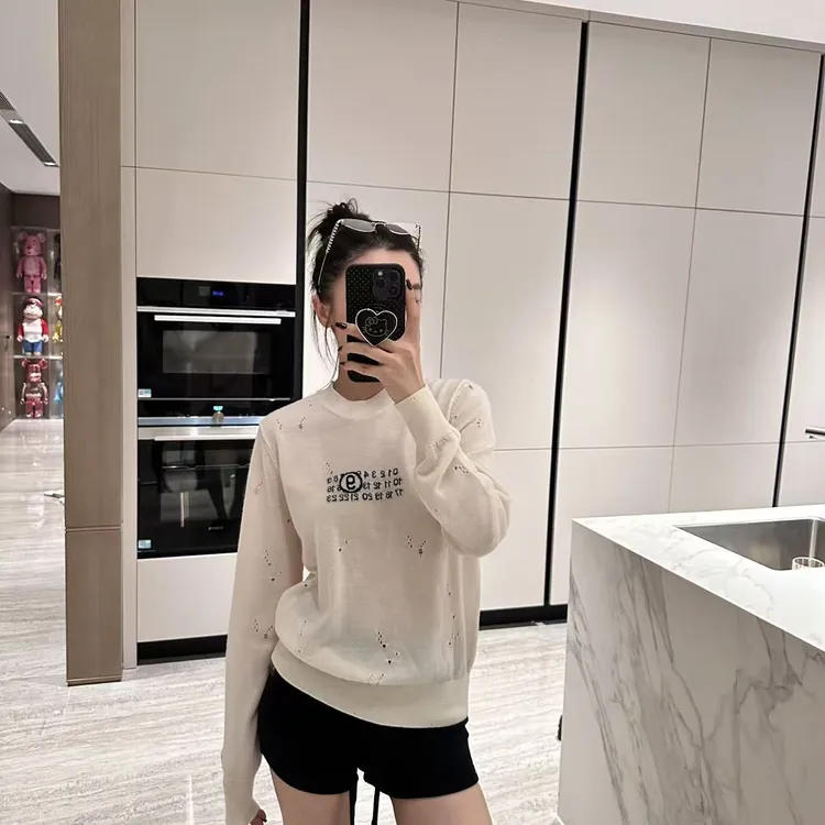 M6破洞百搭针织毛衣