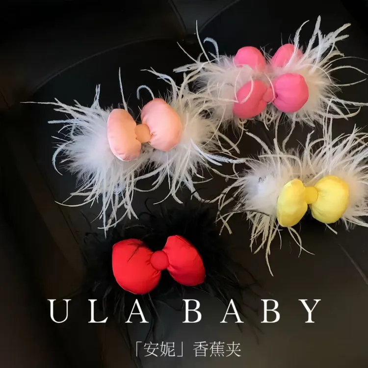 【喜儿ula】11-7-4「安妮」甜美可爱小蝴蝶结羽毛时尚香蕉夹