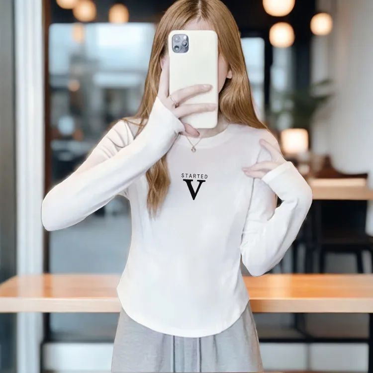 早秋新款显瘦弧形长袖t恤女款打底纯棉正肩修身韩法薄款圆弧下摆