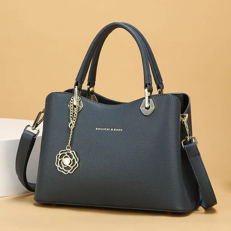 袋鼠2025新款百搭时尚单肩斜挎包中老年妈妈包休闲洋气真皮手提包