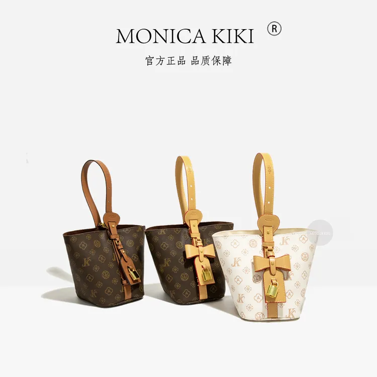MONICA KIKI/莫妮卡奇奇轻奢新款水桶女士斜挎包时尚百搭印花潮流