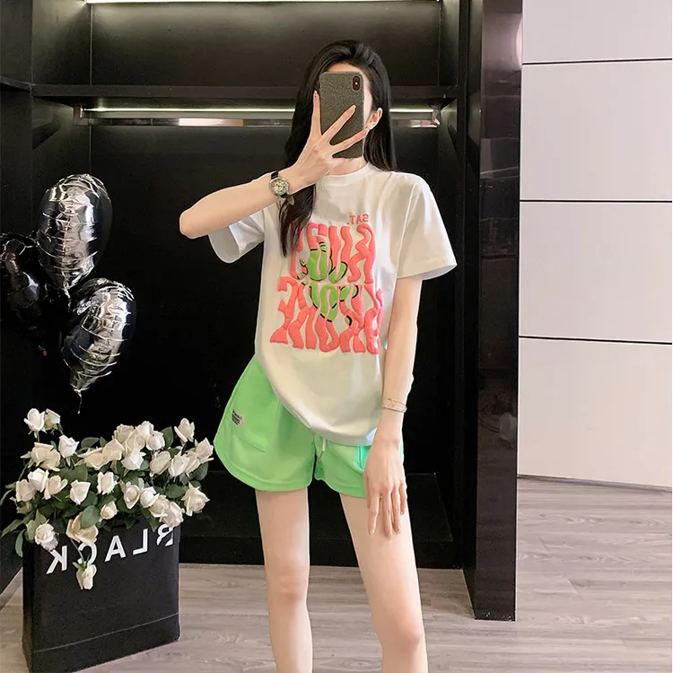 多巴胺穿搭休闲运动套装女宽松减龄白色短袖t恤绿色短裤夏季新款