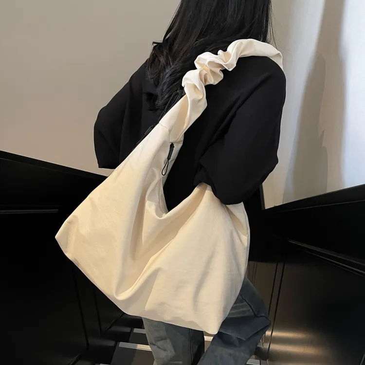 帆布包包女大容量2025新款春夏百搭单肩斜挎包布袋褶皱上课托特包