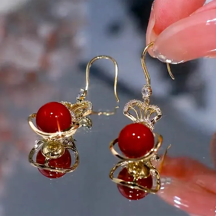 铜合金耳饰 2025新年喜气洋洋钱袋耳环国风气质时尚秋冬红色耳饰