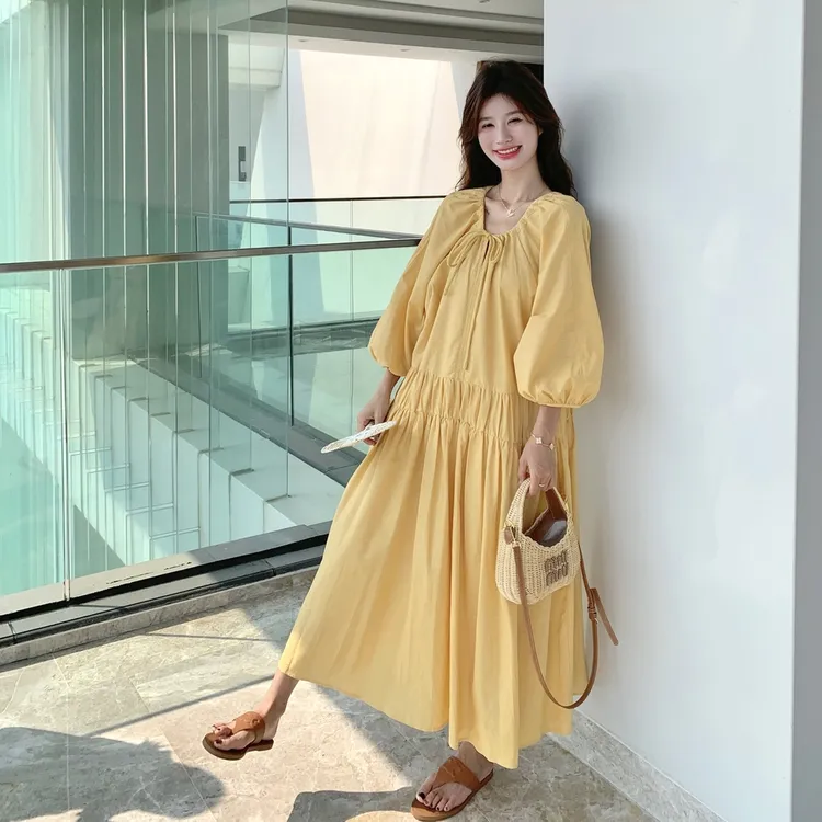 黄色度假风灯笼袖连衣裙女2025夏季新款法式复古高级感气质长裙子