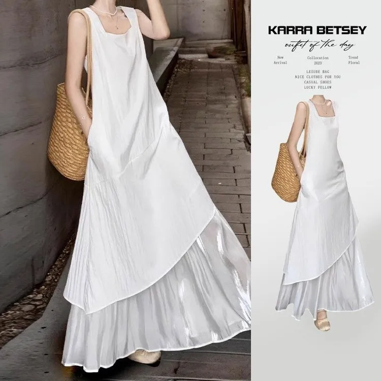 然然白色背心裙女夏季新款法式宽松设计感中长款不规则吊带连衣裙