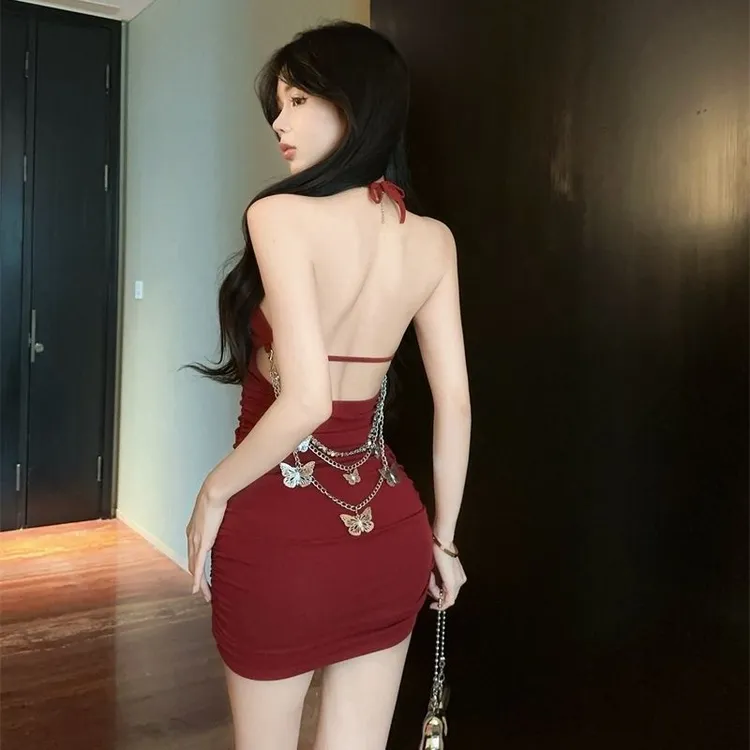 2025夏季纯欲性感挂脖露背吊带修身显瘦带蝴蝶链条辣妹包臀连衣裙