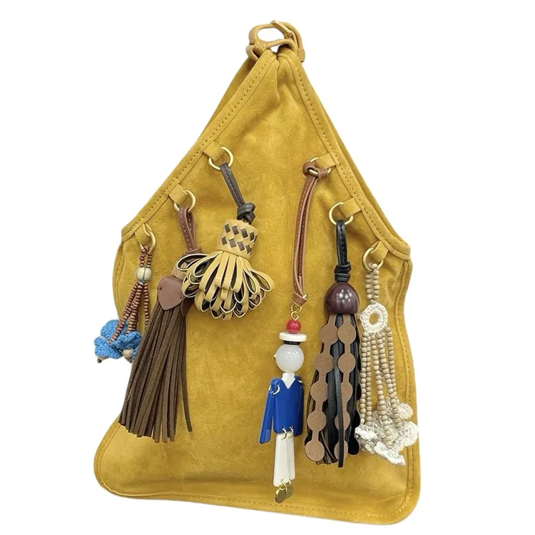 夏季羊皮手提包包小众设计玩偶挂件包真皮手拎包流苏腋下包女包