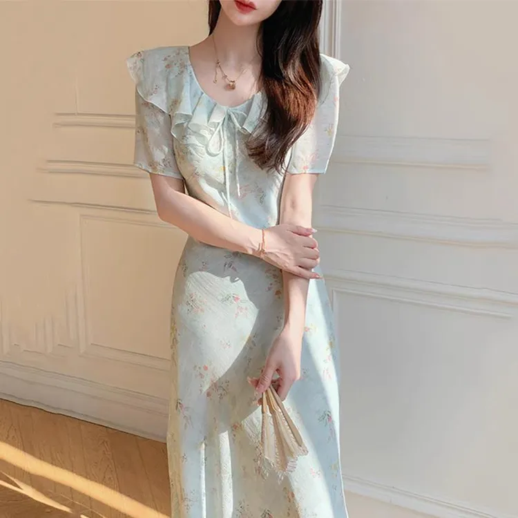 高级感荷叶边法式显瘦碎花连衣裙女夏季2025新款薄荷绿印花长裙子