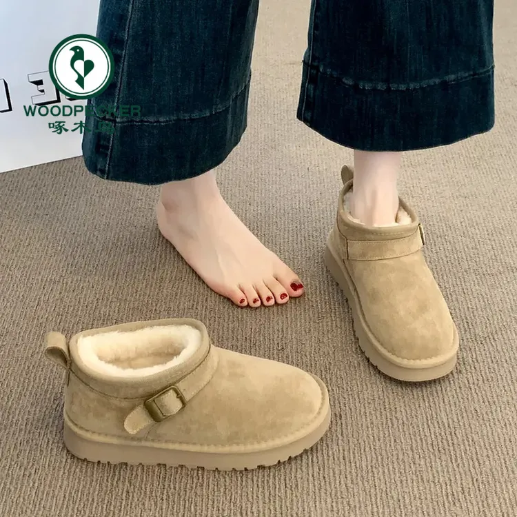 啄木鸟厚底皮毛一体雪地靴女冬2025新款加绒短筒棉靴东北雪地棉鞋