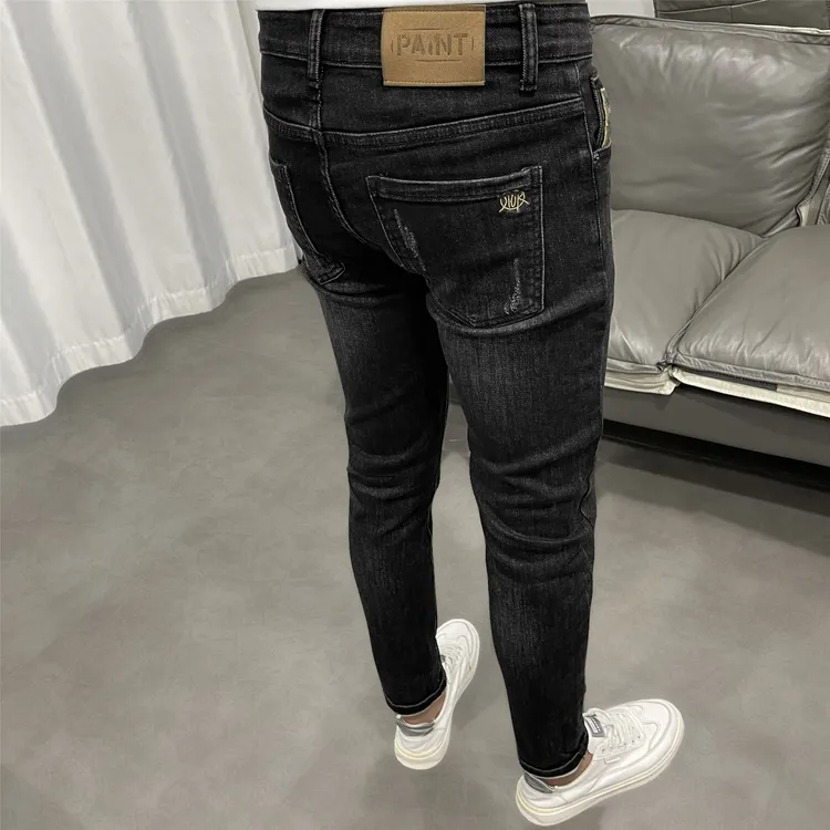 2025冬季加绒抓毛黑色九分牛仔裤男潮流时尚韩版修身小脚弹力长裤