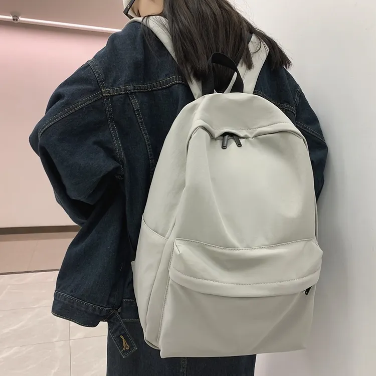 批发新款学生书包男韩版原宿风单色双肩包女时尚ins潮大容量背包