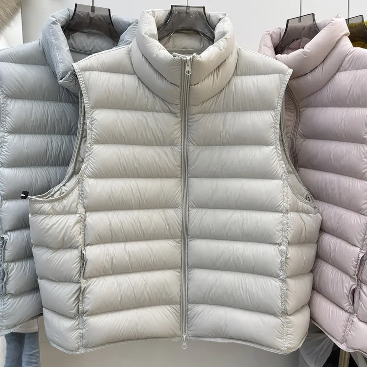 90白鸭绒秋冬新款加厚排骨羽绒马甲女短款保暖背心羽绒服马夹团