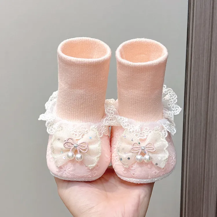 春秋车缝线植物花卉一脚蹬女袜鞋软底新生婴防滑宝宝步前鞋蝴蝶结