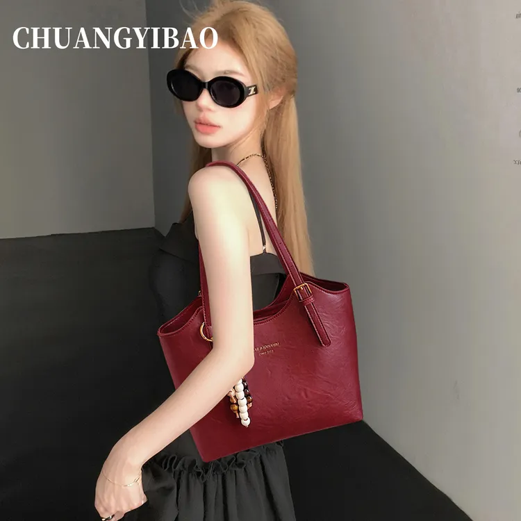大容量红色托特包包女2025新款秋冬小众质感通勤手提单肩新娘婚包