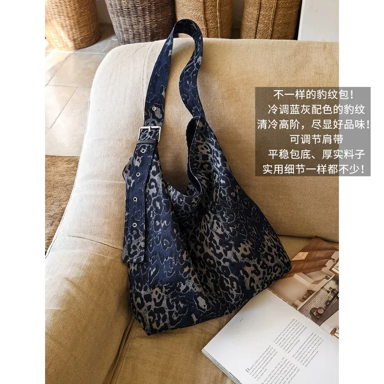 美洋MEIYANG 蓝豹帆布包 【商城同款】印花可调节肩带单肩包-周四