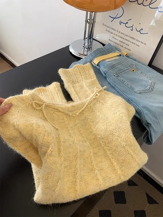黄色蝴蝶结系带圆领长袖毛衣女秋冬季新款慵懒风高级感针织衫上衣