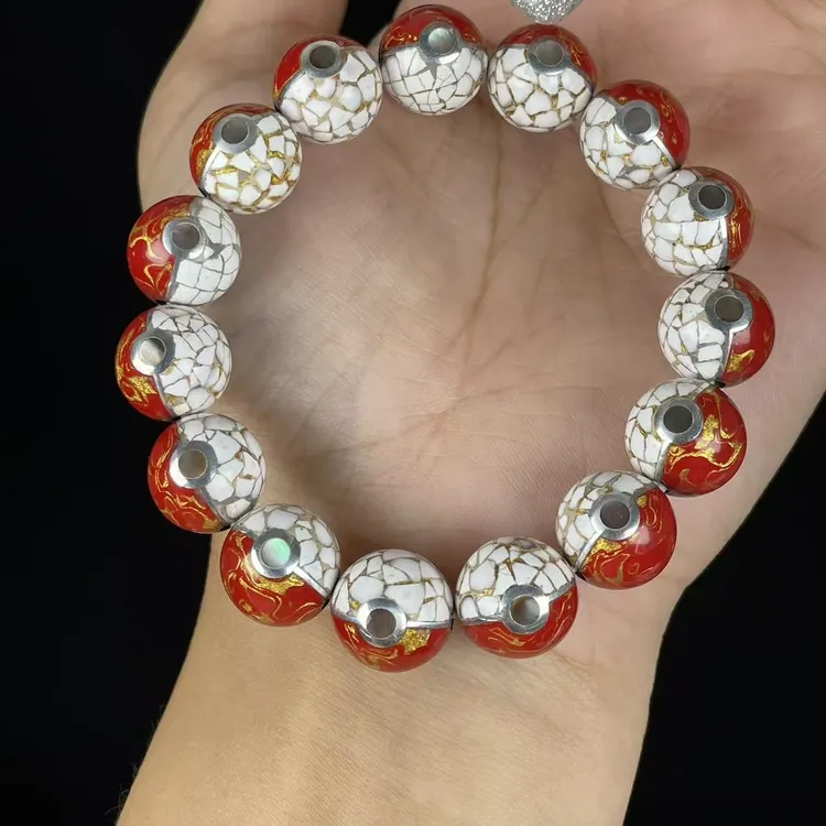 大漆工艺掐丝皮卡丘精灵球双色