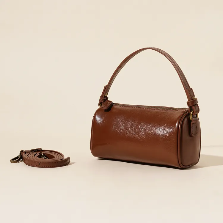 岩牛简约风方形单肩圆筒式斜挎包女士YN3646