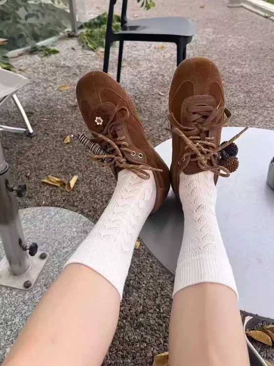 诗歌兰女鞋2025年秋新款真皮厚底增高德训鞋女百搭休闲运动板鞋女