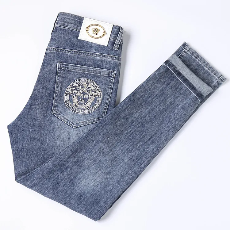喇叭裤欧货牛仔裤男式品牌魔女头绣花牛仔裤男士修身高档牛仔裤男