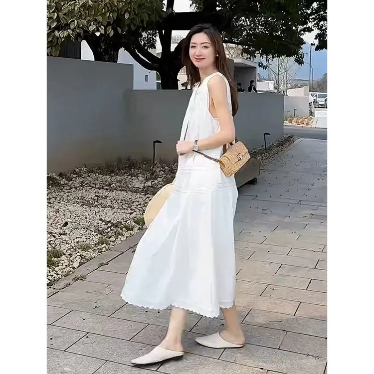 初心法式轻奢镂空绣花重工设计感连衣裙女夏新款宽松浪漫长裙