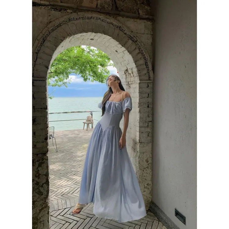 蓝色荷叶袖连衣裙女2025新款高级感收腰显瘦大裙摆A字长裙子