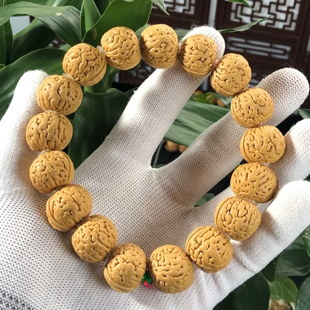 18mm黄油皮金鱼肚桃核手串皮质好密度高份量压手