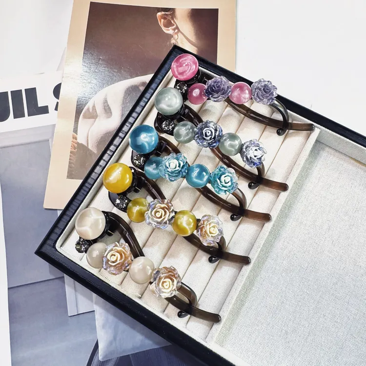 2025新款夏天简约盘发一字扭扭夹高级感设计珠珠水钻千金风发夹女