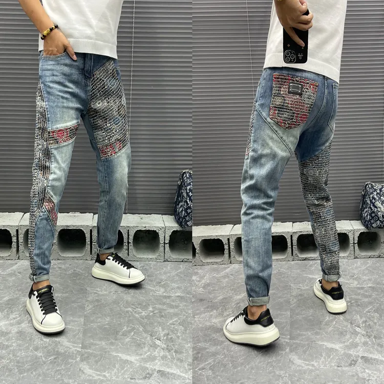 高端欧货拼接重工艺刺绣男士牛仔裤春秋季休闲时尚奢潮水洗蓝色潮