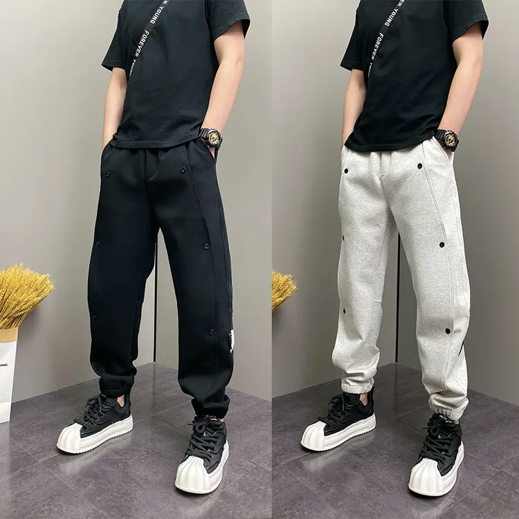 休闲裤2025秋季新款时尚排扣束脚哈伦裤男潮牌百搭纯色小脚运动裤