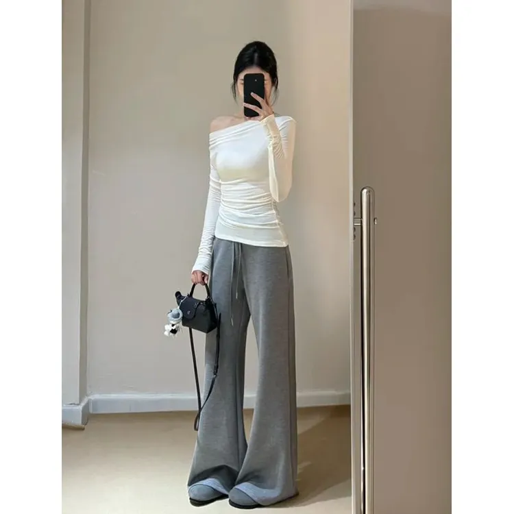 纯欲性感白色斜肩长袖t恤女2025春秋薄款内搭软糯修身打底衫上衣