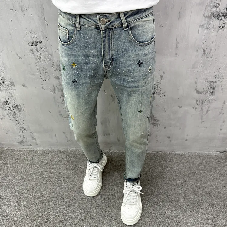 烫钻刺绣牛仔裤男秋季爆款欧货轻奢潮牌复古百搭修身蓝色小脚长裤