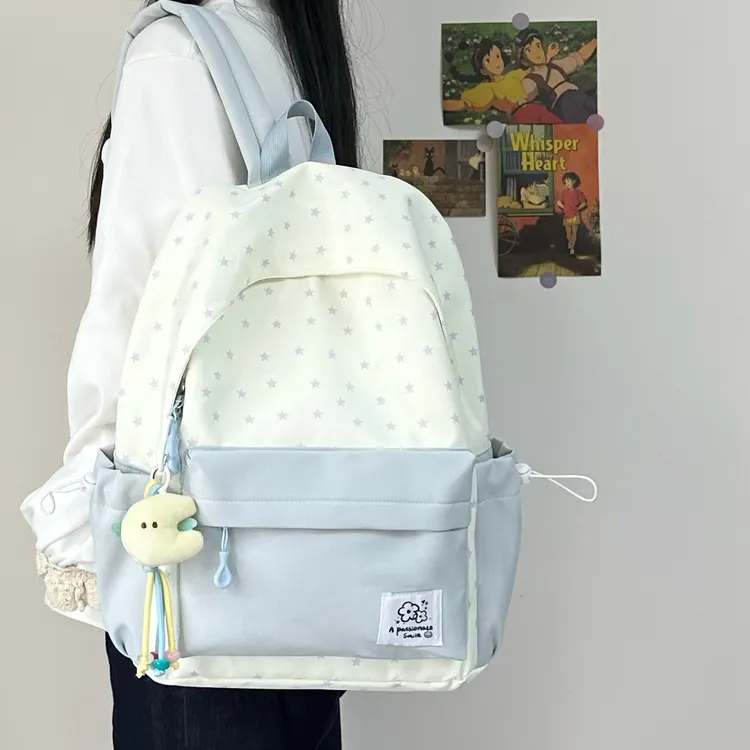 日系韩版简约百搭大容量初中高中大学生可爱双肩包