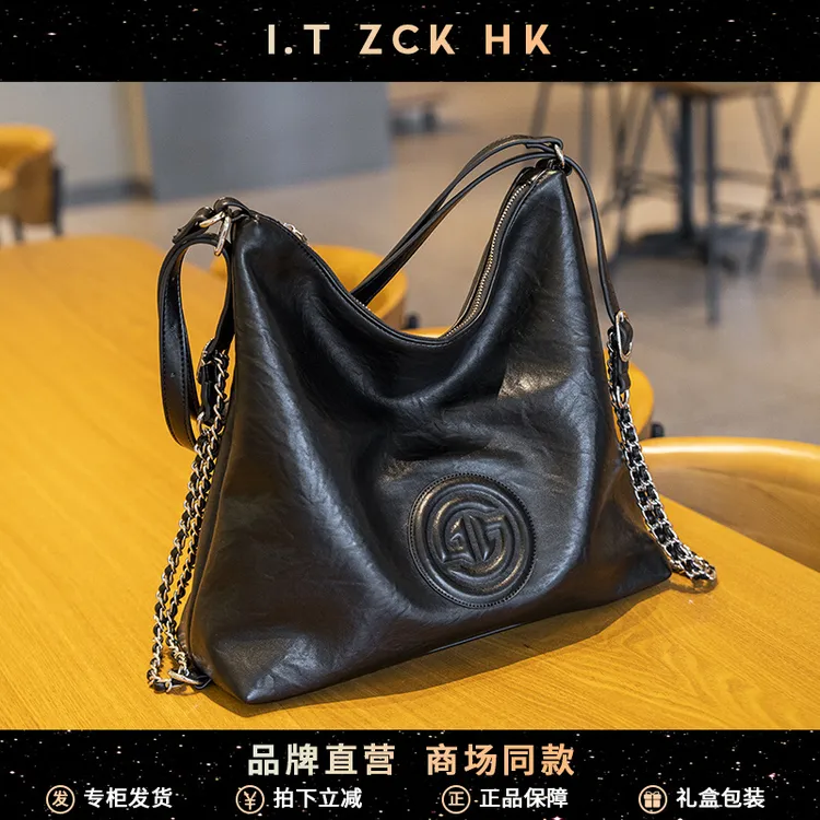 双肩包女休闲托特大包容量黑色软皮女士单肩包2025新款包包