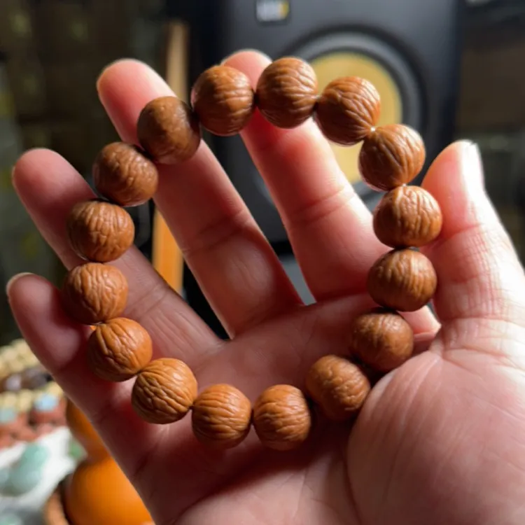 精品凤羽猴头手串二月红