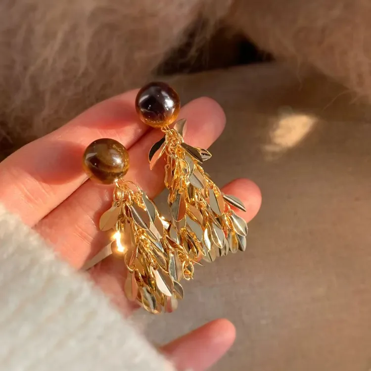 铜合金树脂耳饰 金色羽翼美拉德虎眼麦穗流苏耳环女秋冬高级感