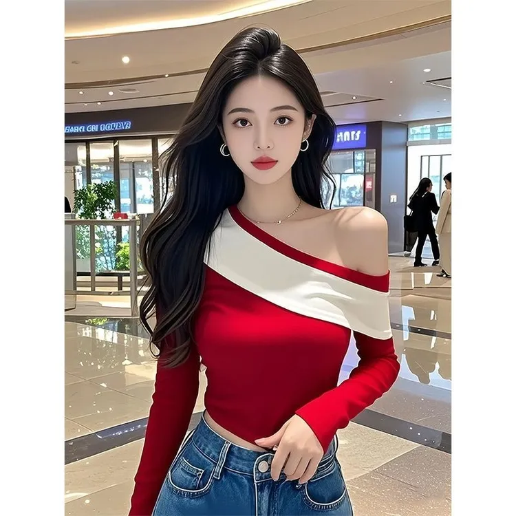 撞色露脐假两件性感风韩版小众设计感长袖修身斜领短款显瘦T恤女