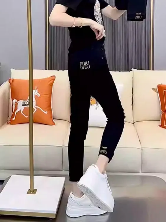 黑色小脚牛仔裤女2025年秋季新款大码胖mm高腰显瘦弹力九分铅笔裤