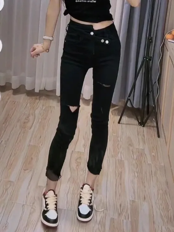 2025年秋季新款黑色破洞小脚牛仔裤女大码高腰显瘦弹力九分铅笔裤