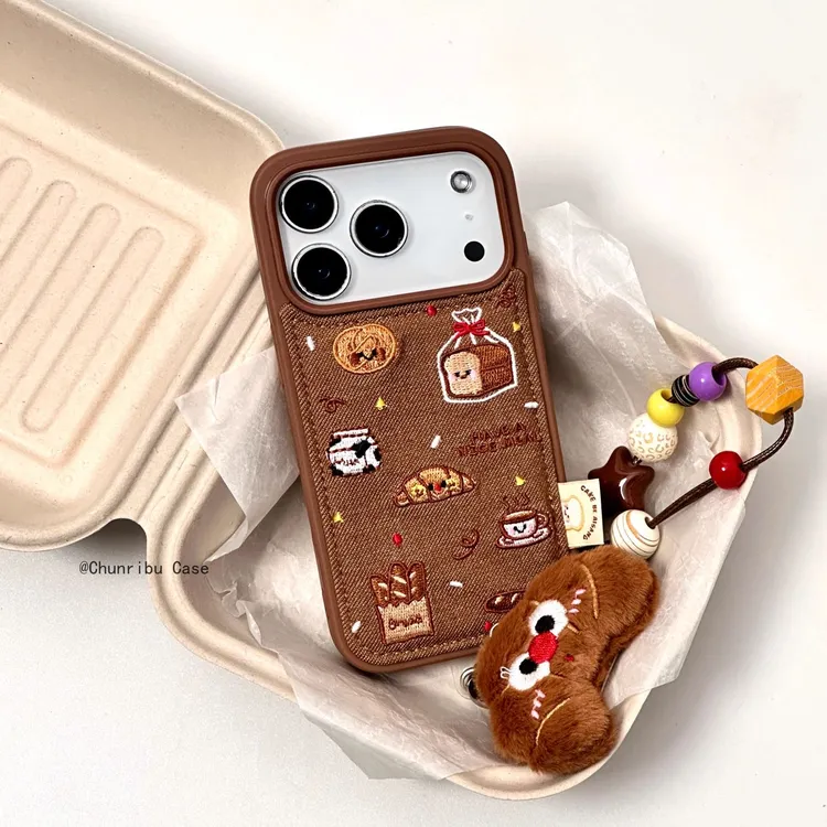 卡通皮纹鼓包美拉德色系面包咖啡适用苹果17/16promax手机壳15/14