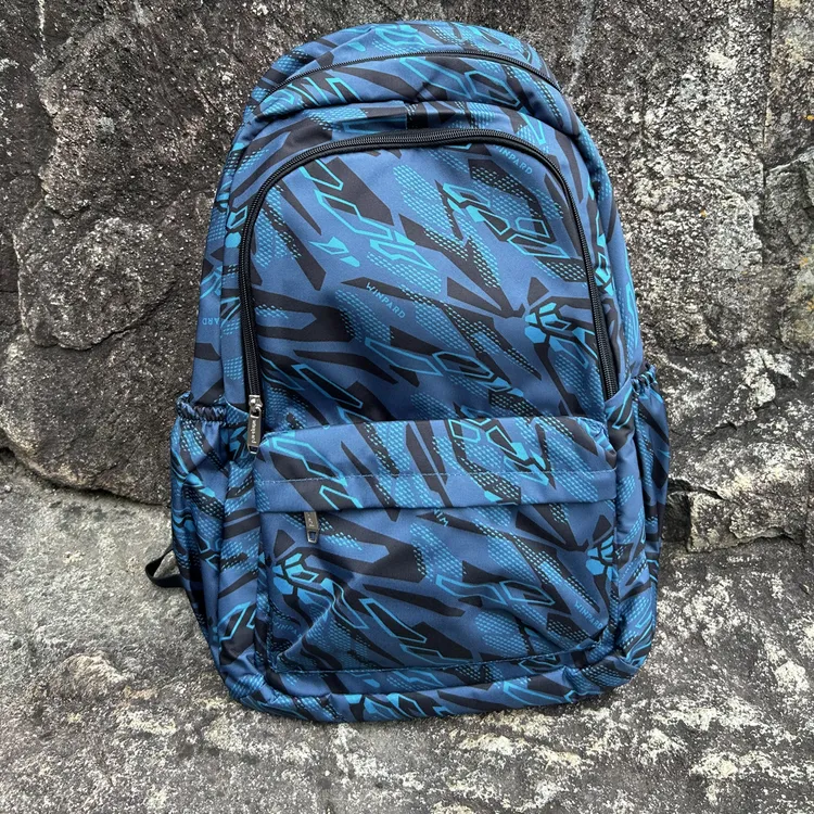 新款威豹双肩包双背包男女通用潮运动休闲防刮耐磨防泼水OS31609