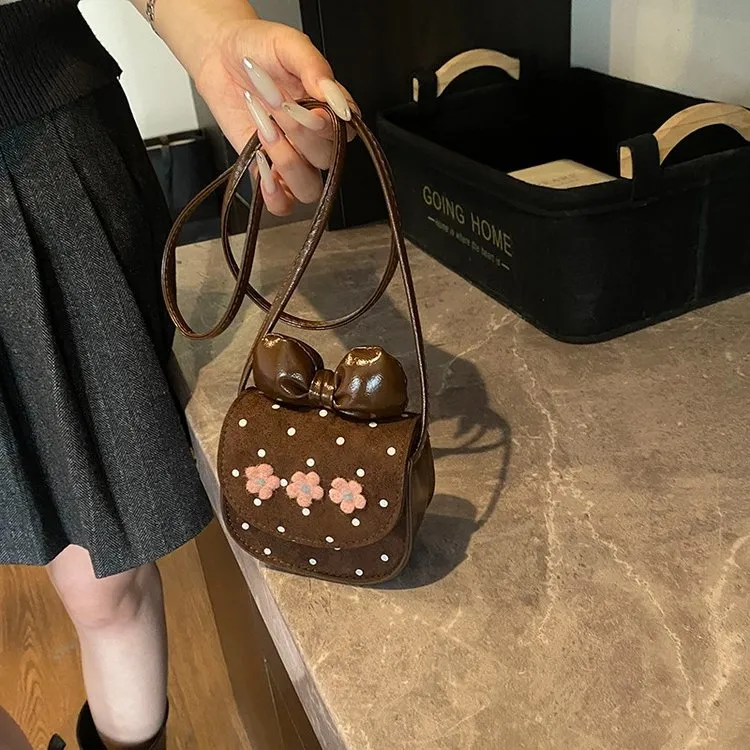 儿童包新款卡通可爱蝴蝶结迷你零钱包印花男女童斜挎包耳机包