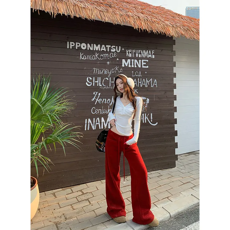 心动密码新款时尚V领扭结修身长袖打底T恤软糯加厚毛呢休闲裤套装