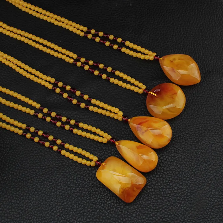 非金属树脂项链 民族风毛衣链吊坠鸡油黄长款项链女士秋冬挂饰男