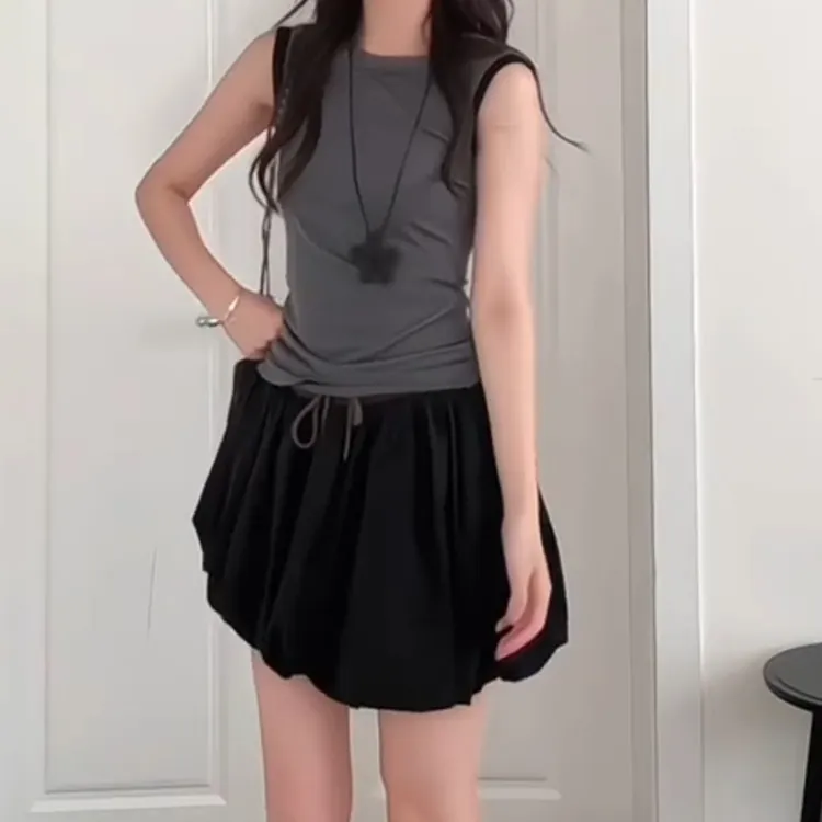 2025夏季新款时尚百搭温柔气质无袖上衣+不规则半身裙LK2504906